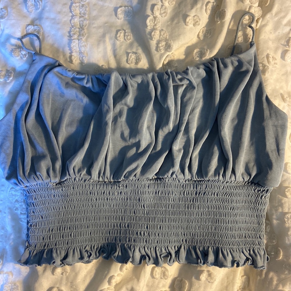 blue ruffled tank top